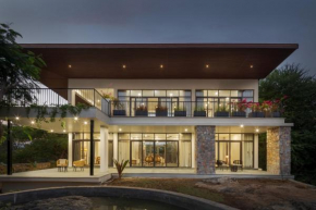 SaffronStays Camelot by the lake - 3 bedroom villa with lake view, games area and lake access
